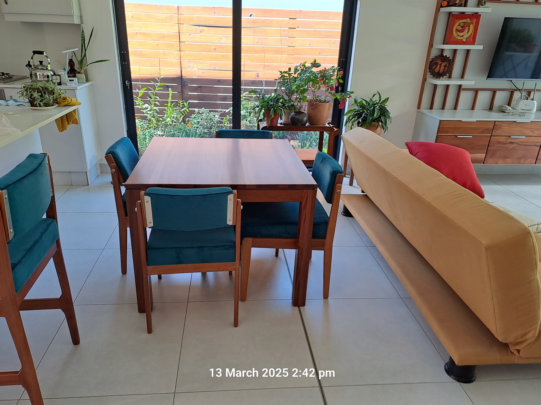 Custom dining table and colourful chair set