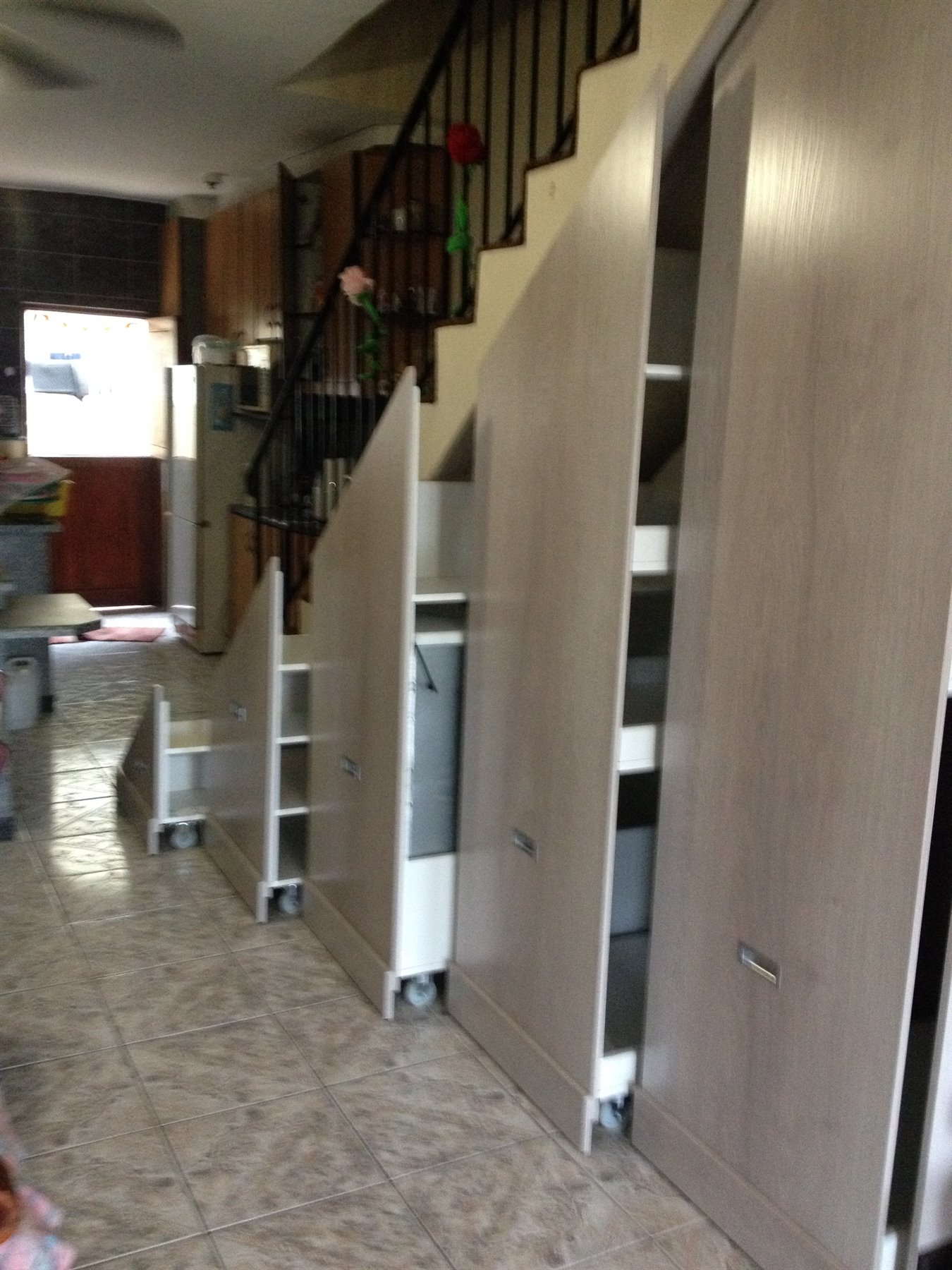 Custom under-stair storage and shelving