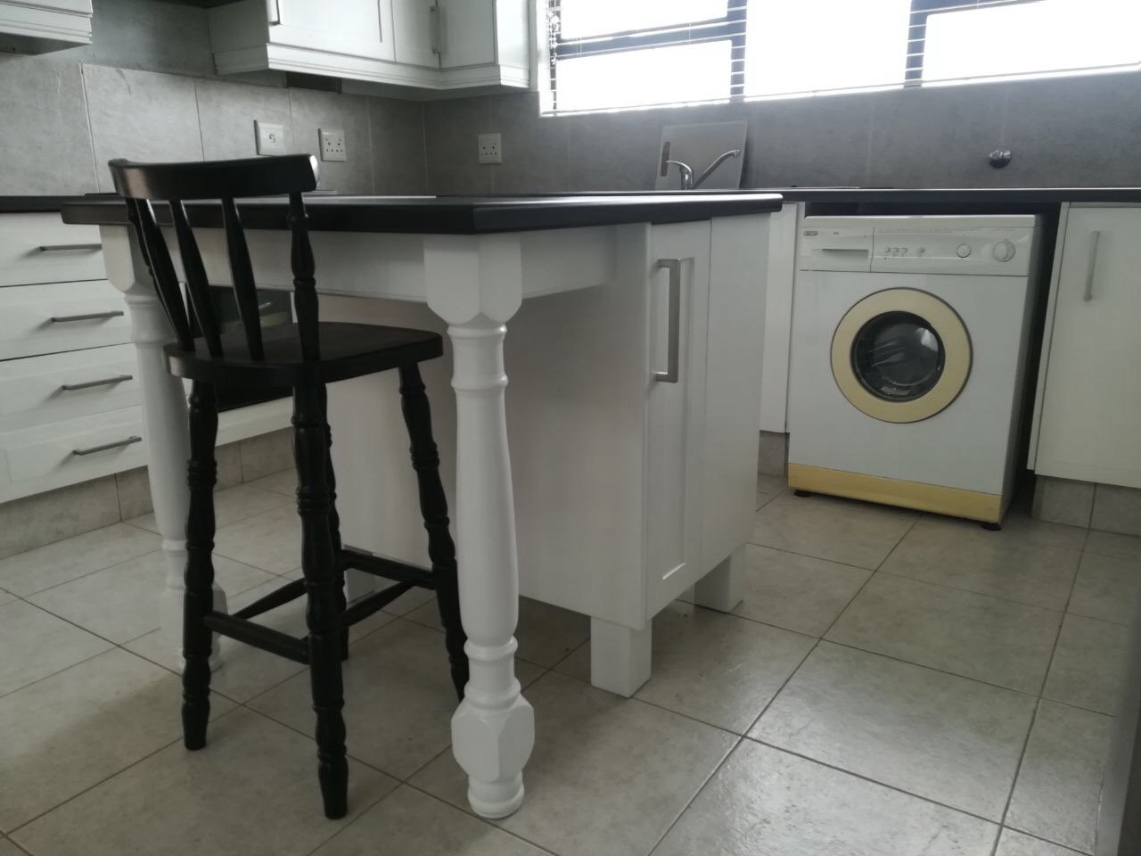 White kitchen island with seating