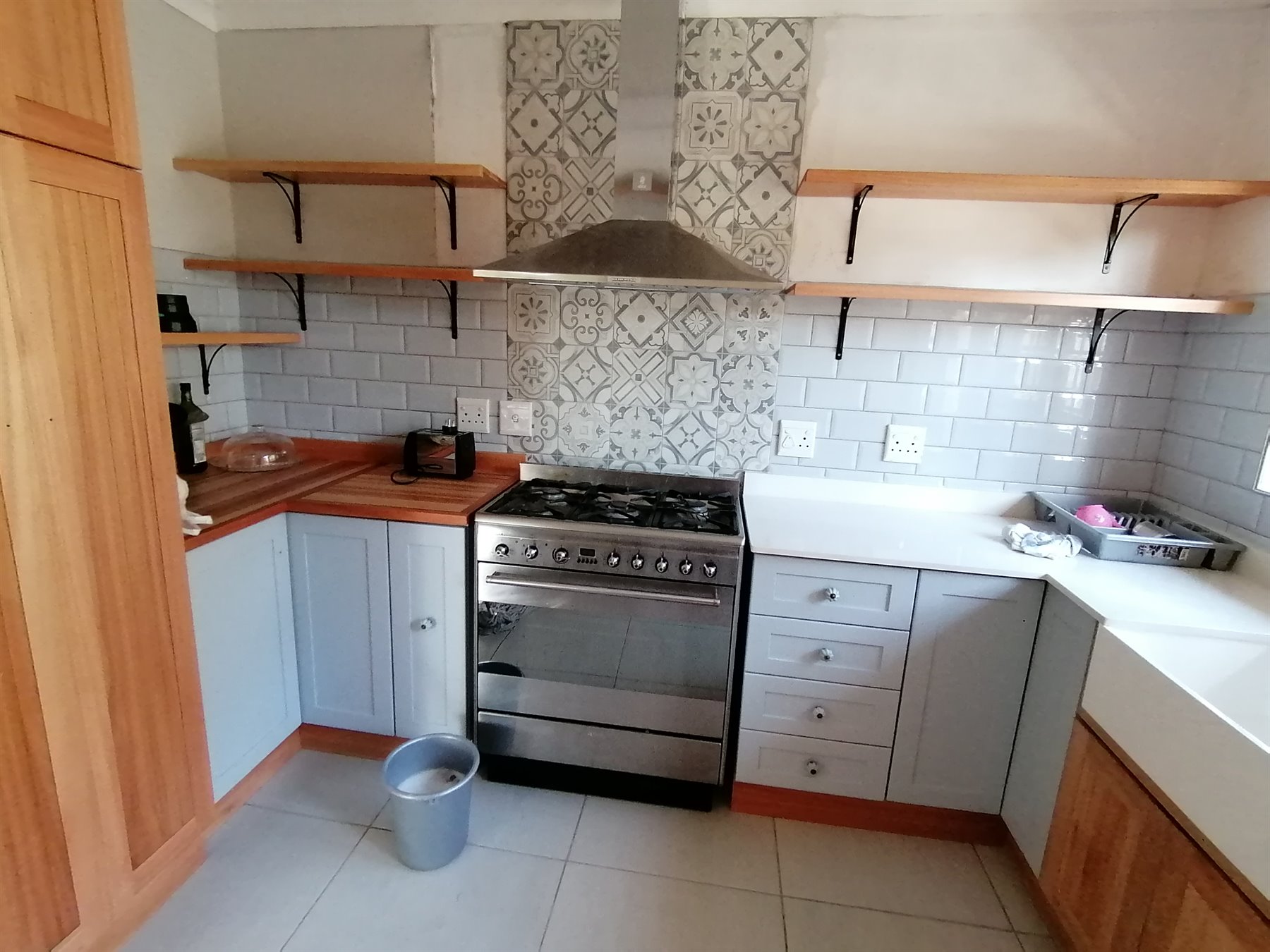Solid wood kitchen cupboards and open shelves