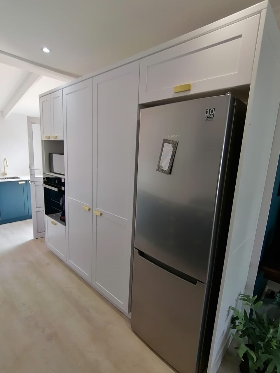 Integrated fridge and pantry cupboard storage