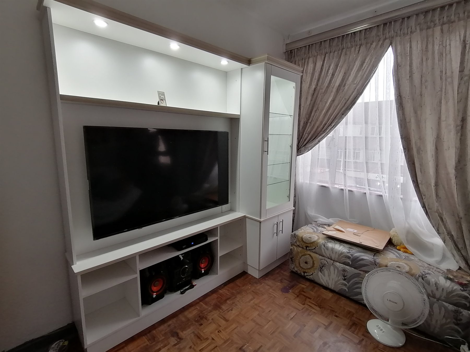 White TV unit with display cabinet