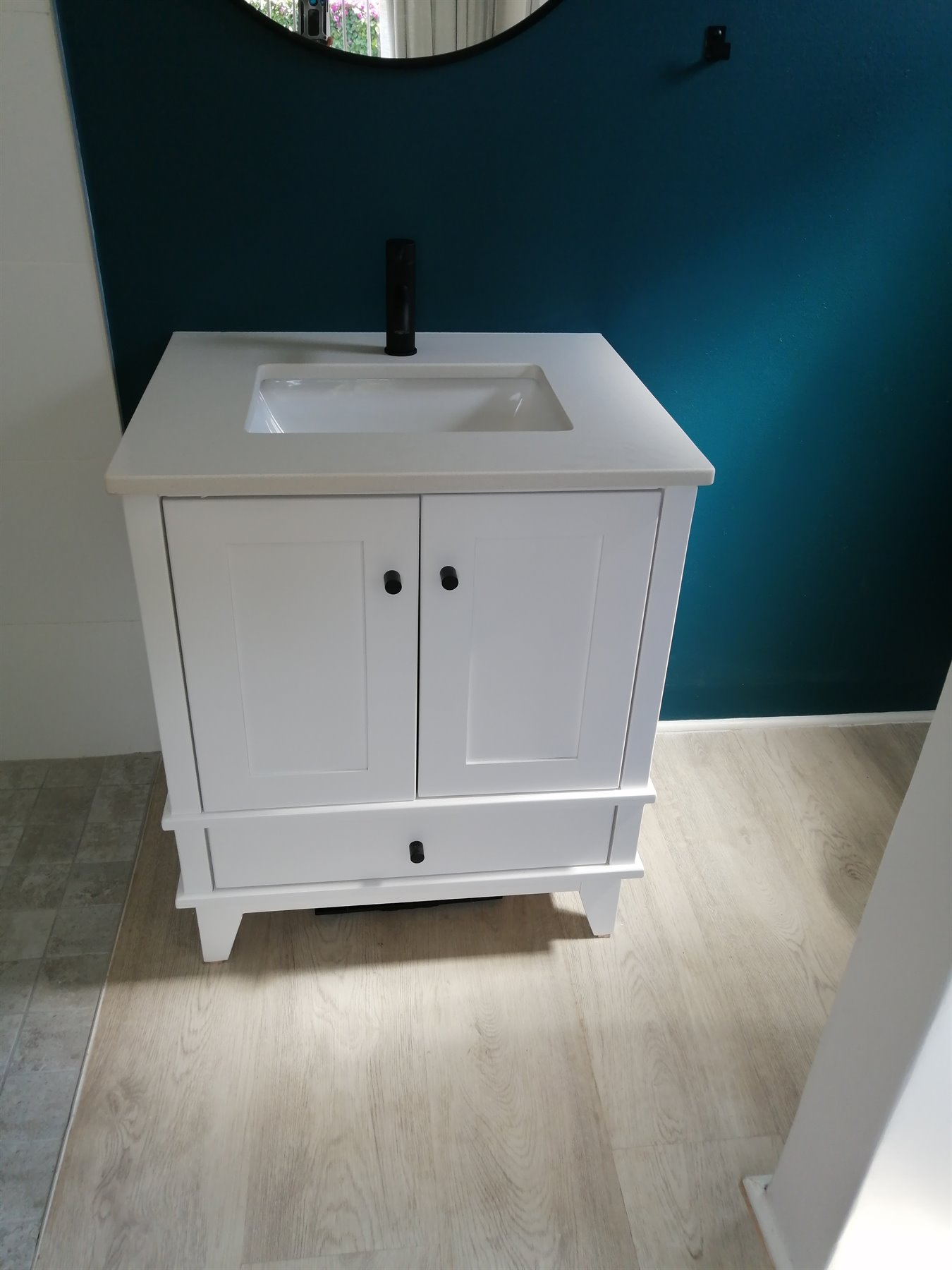 Compact white bathroom vanity