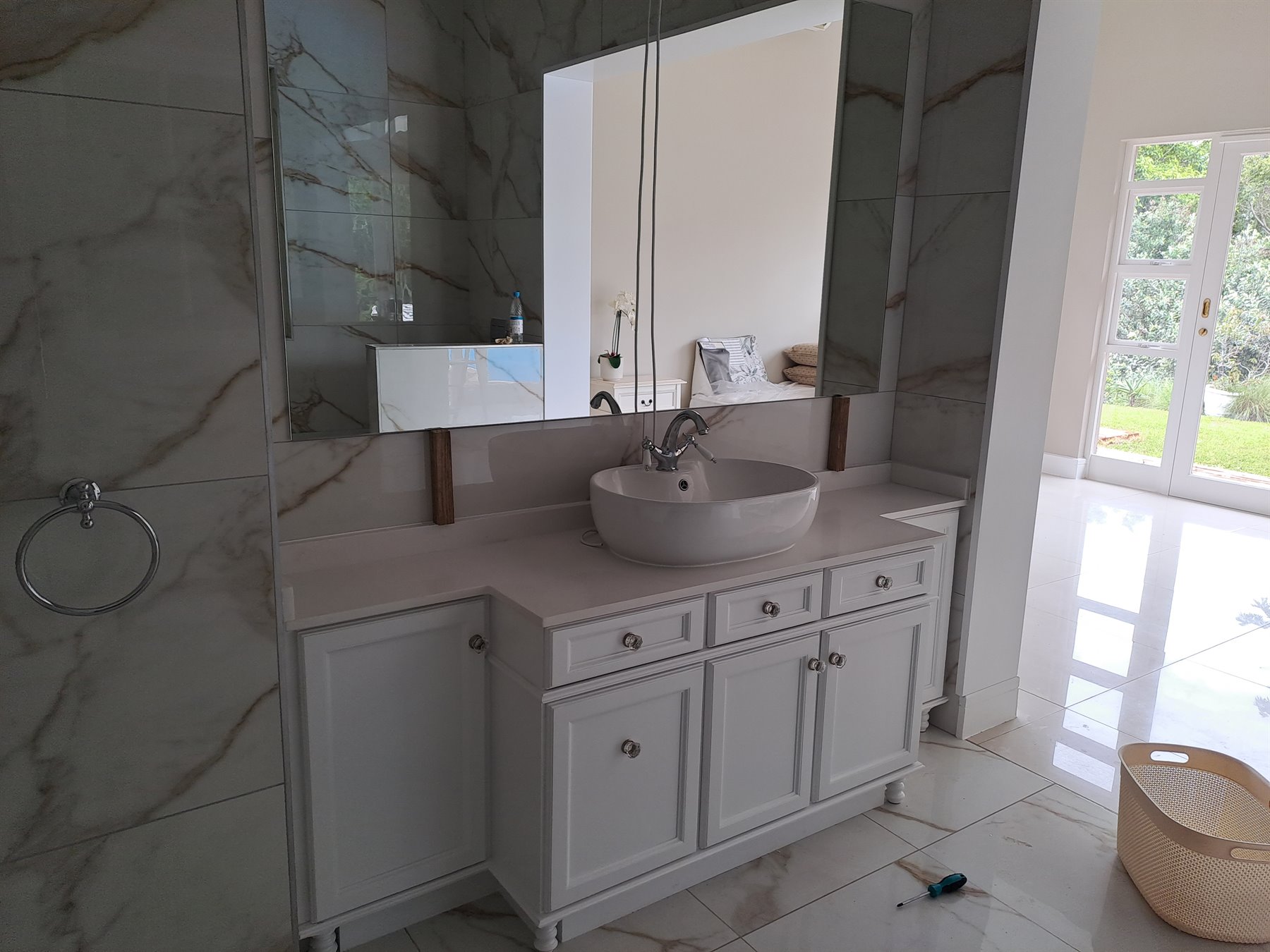 Double bathroom vanity with matching mirrors