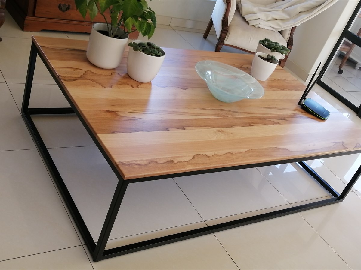 Solid wood children table and chairs in workshop