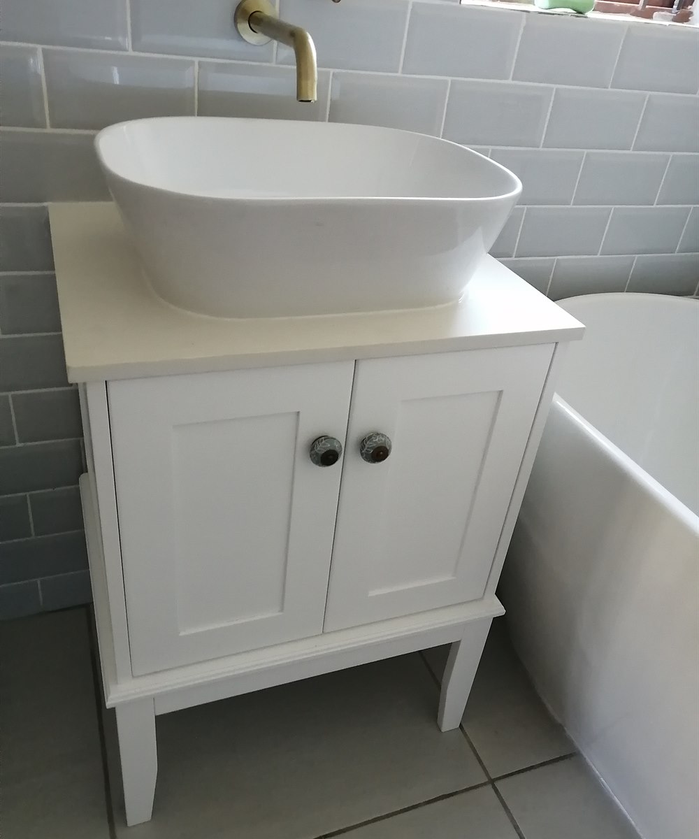 Custom white bathroom vanity made by 2G Custom Furniture