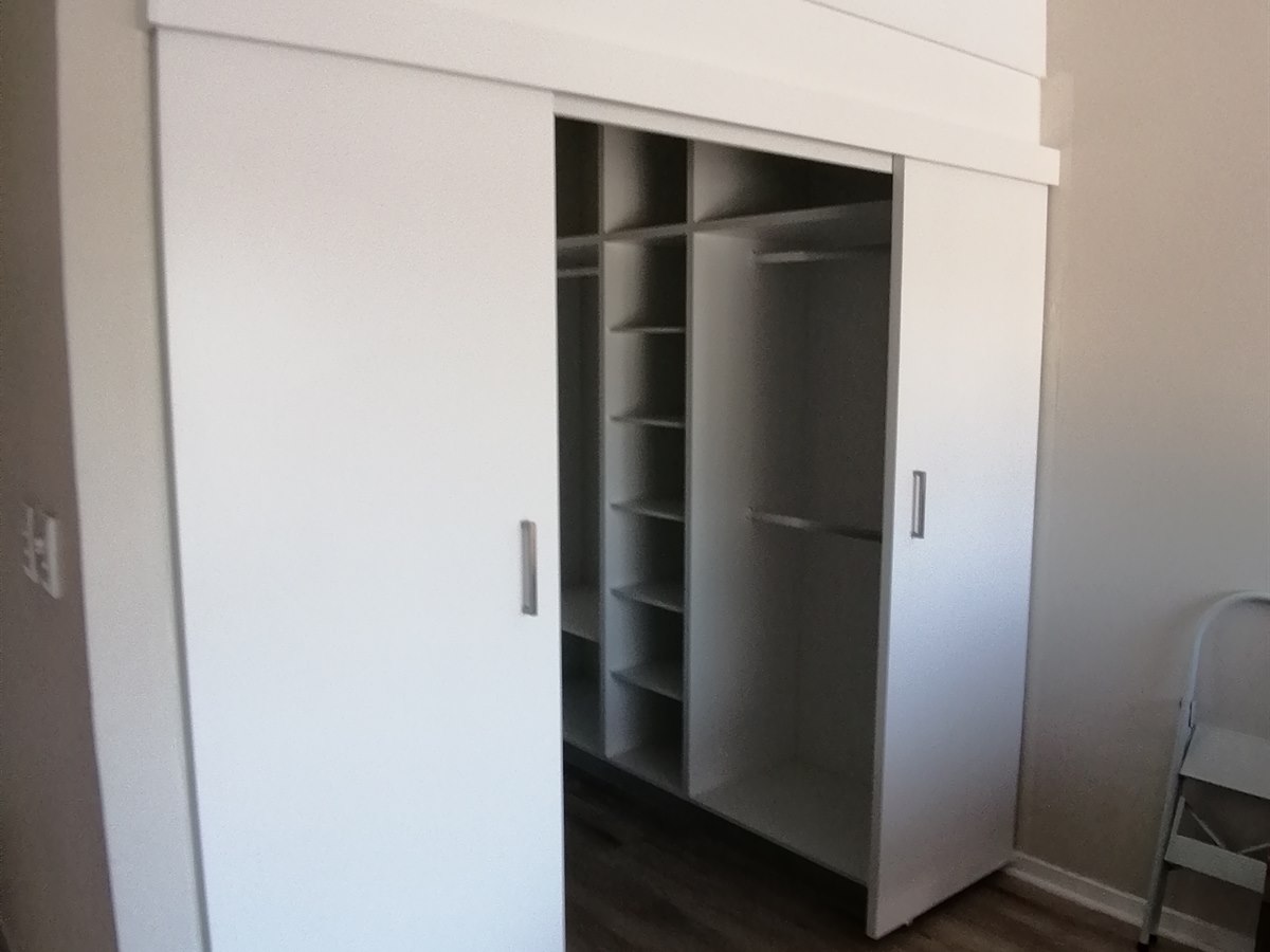 Built-in wardrobe installation by 2G Custom Furniture